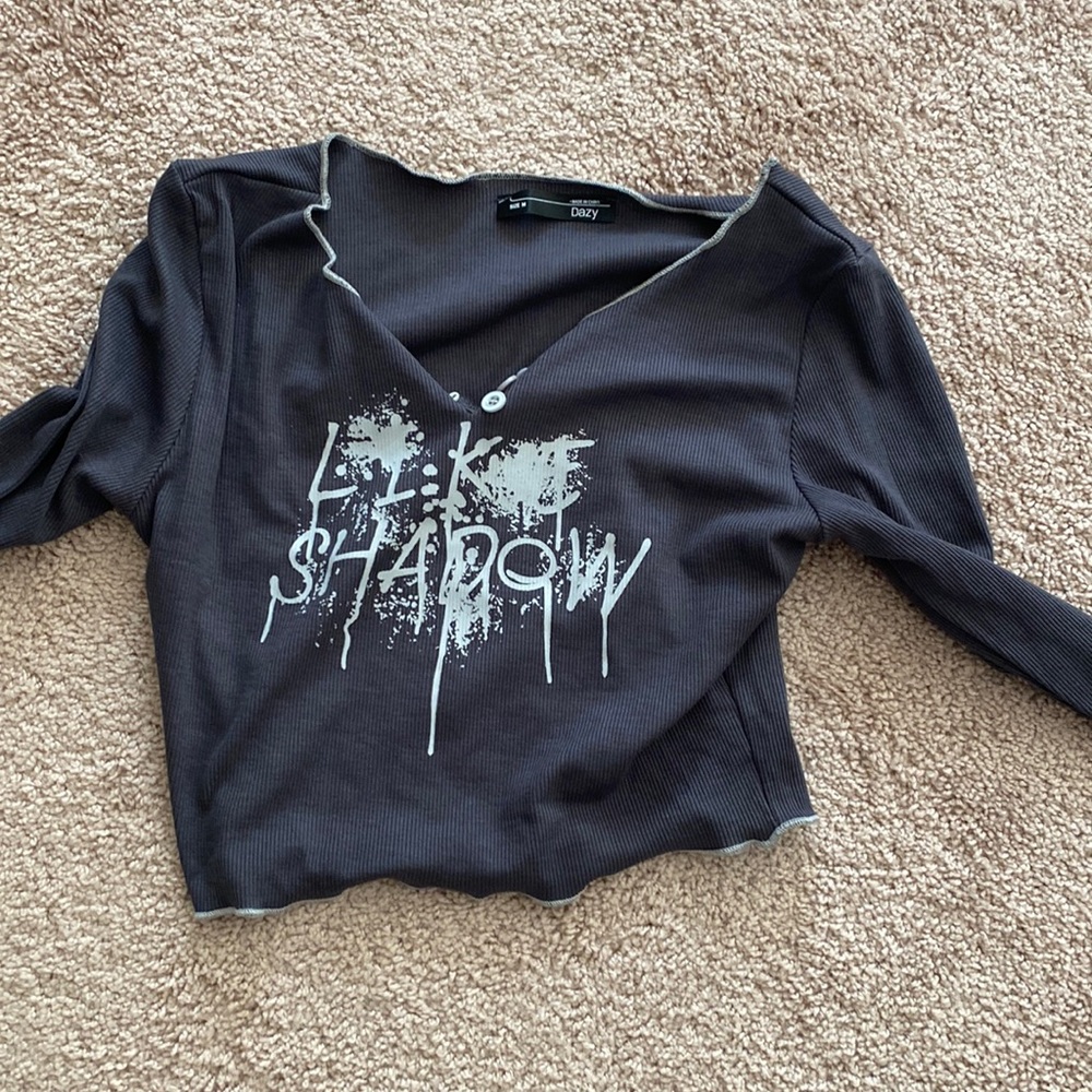 A cropped V neck